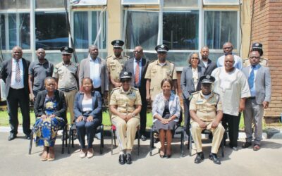 HRC-Z Vice Chairperson confers with Zambia Police Deputy Inspector General